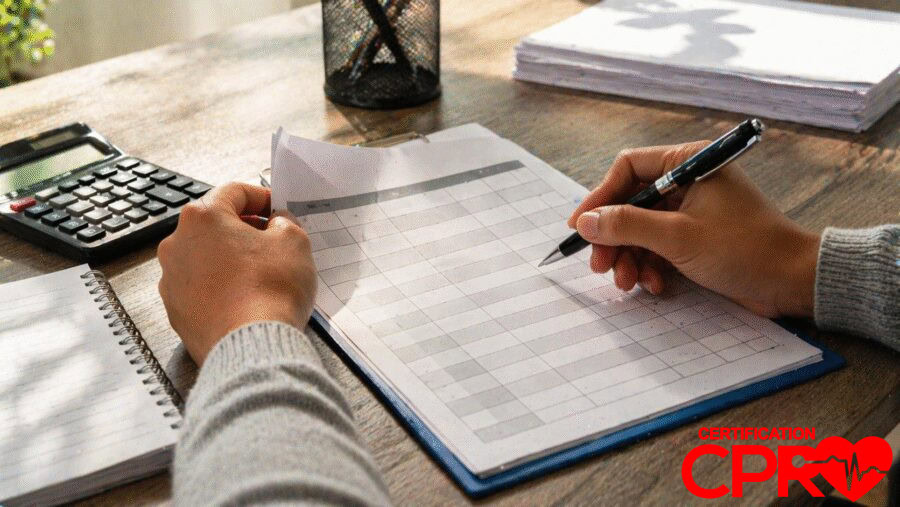 Person filling out a form for CPR certification in West Palm Beach, Florida.